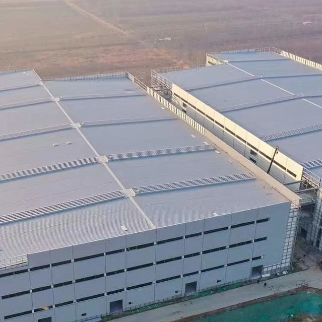 Edificio de almacén prefabricado de metal resistente a la corrosión OEM con marco de portal